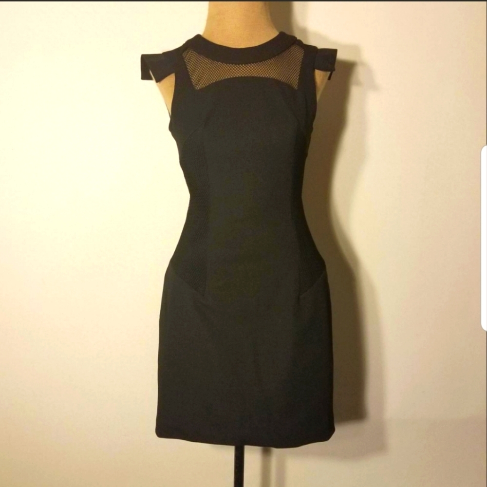 Sexy backless fishnet bodycon dress by Faith In Love size 8 in black.